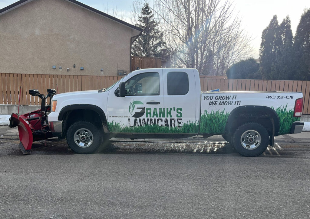 Image of Franks Lawn Care branded truck